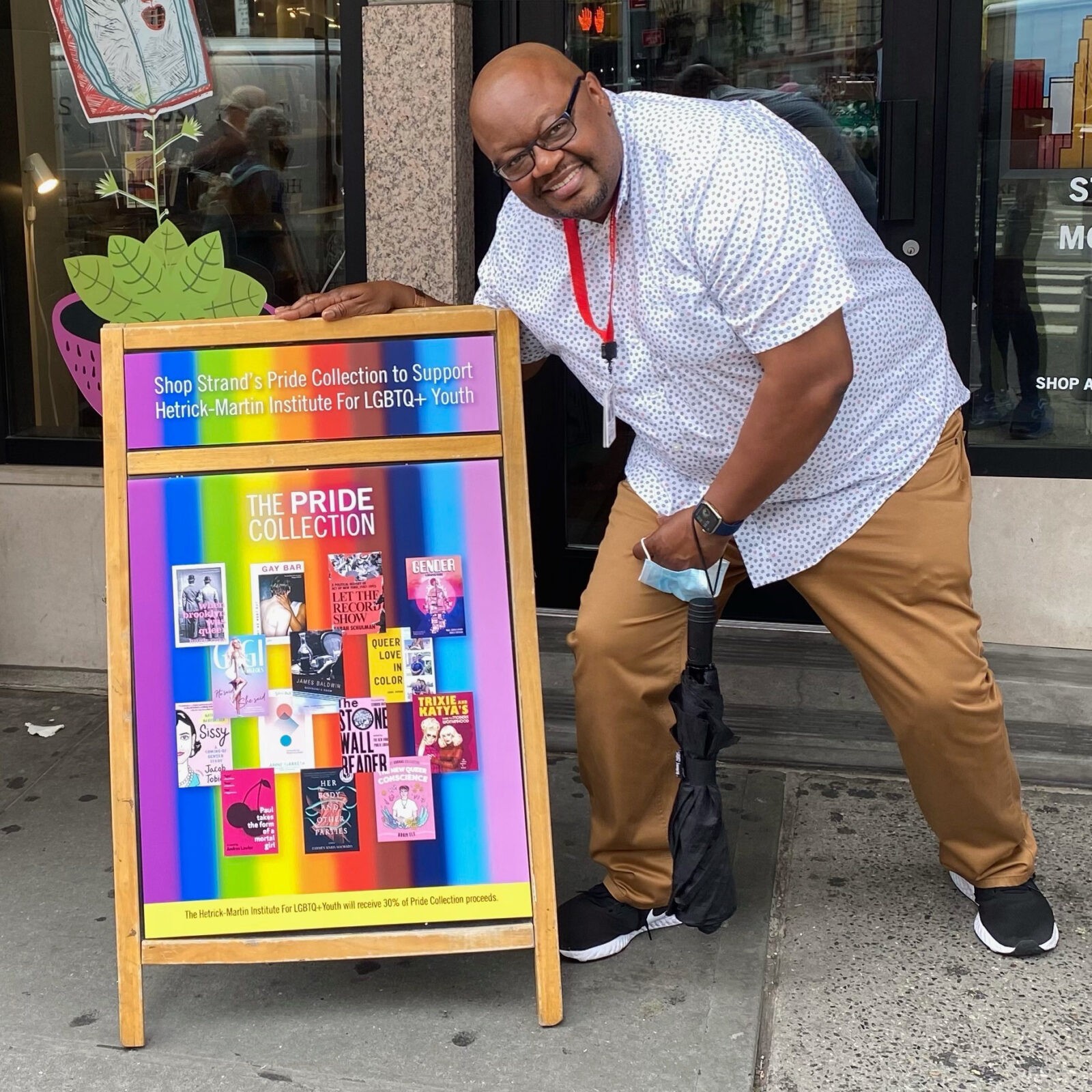 CEO Joe Pressley checking out the Pride Collection at Strand Books